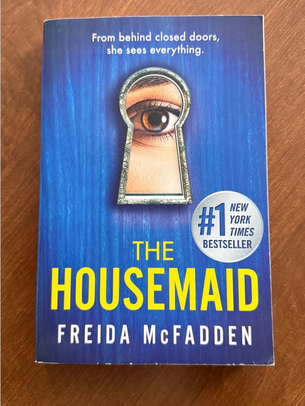 The Housemaid by Freida McFadden - Blue & Yellow Paperback Thriller